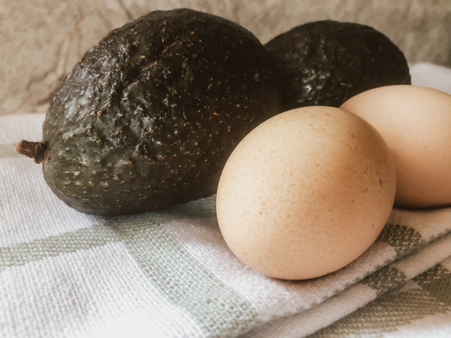 Homegrown eggs and healthy avocados.