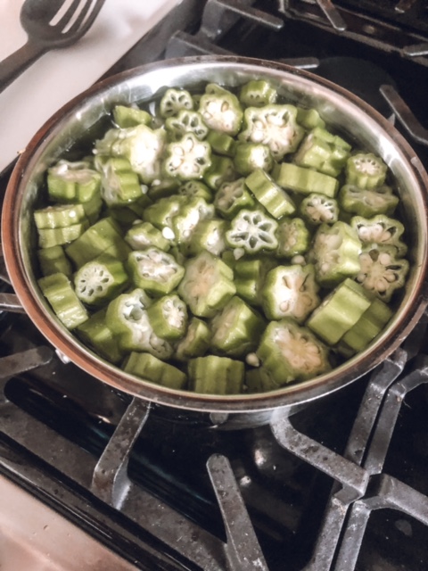 Canning okra step one.