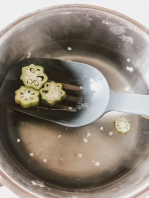 Remove okra from the mixture with a slotted spoon.